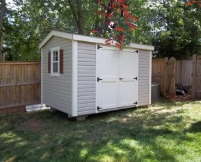 Gable Shed with Red Shutters